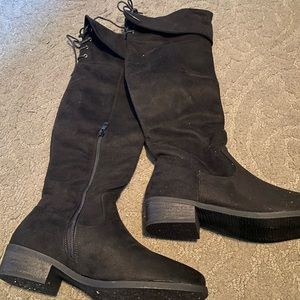 Tall black suede boots